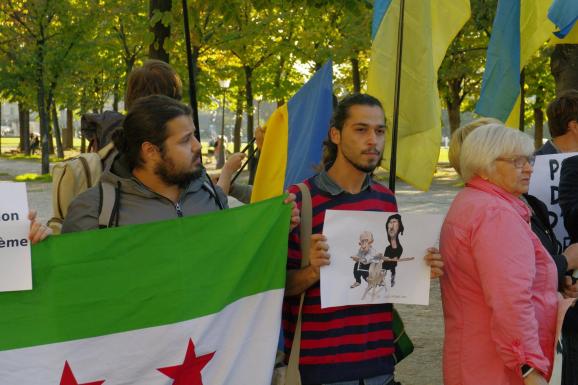 Сирія Україна Путін Асад Париж протест