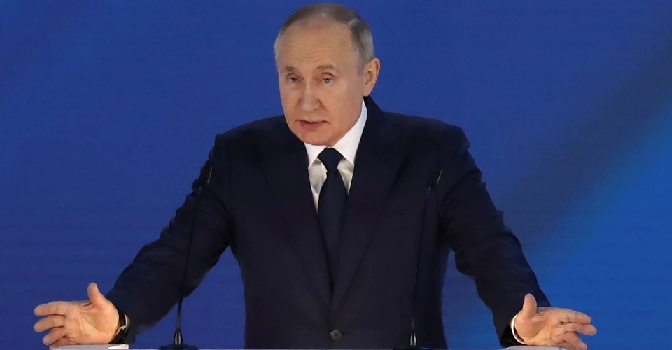 путін
