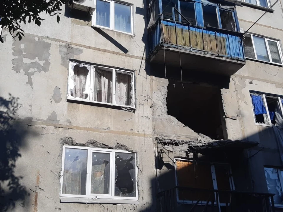 окупанти обстріляли багатоповерхівку