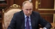 путін