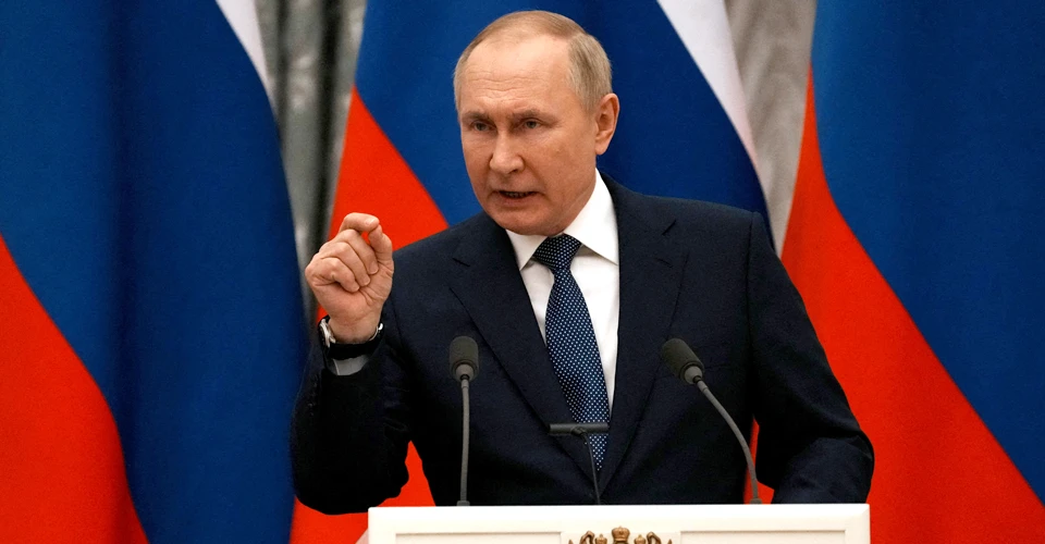 Путин