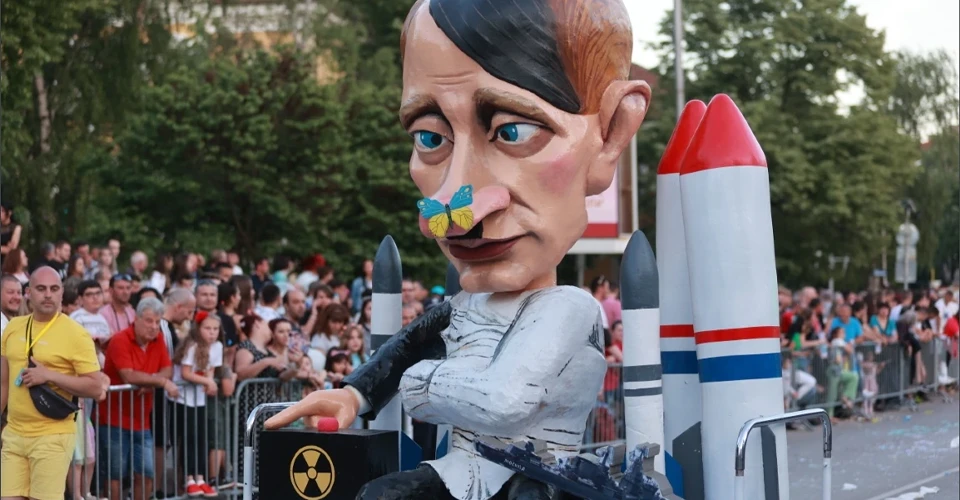 путін