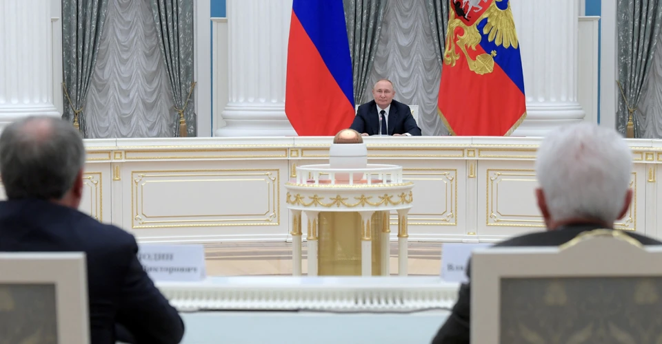 путін