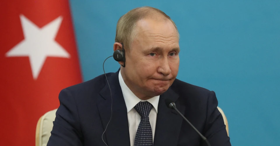 путін