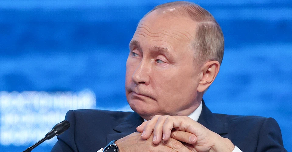 путін