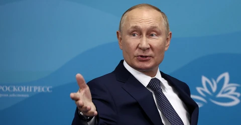 путін