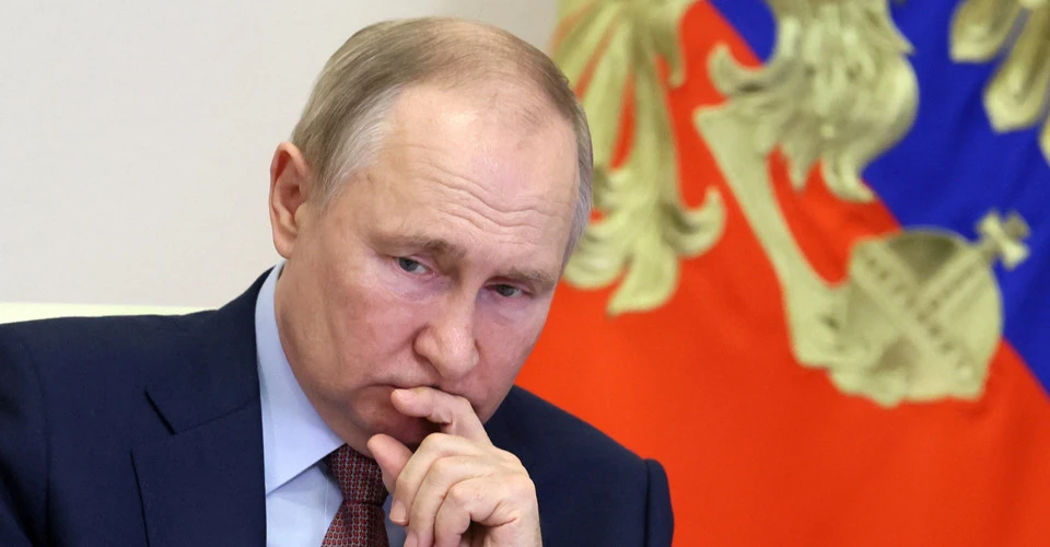 путін