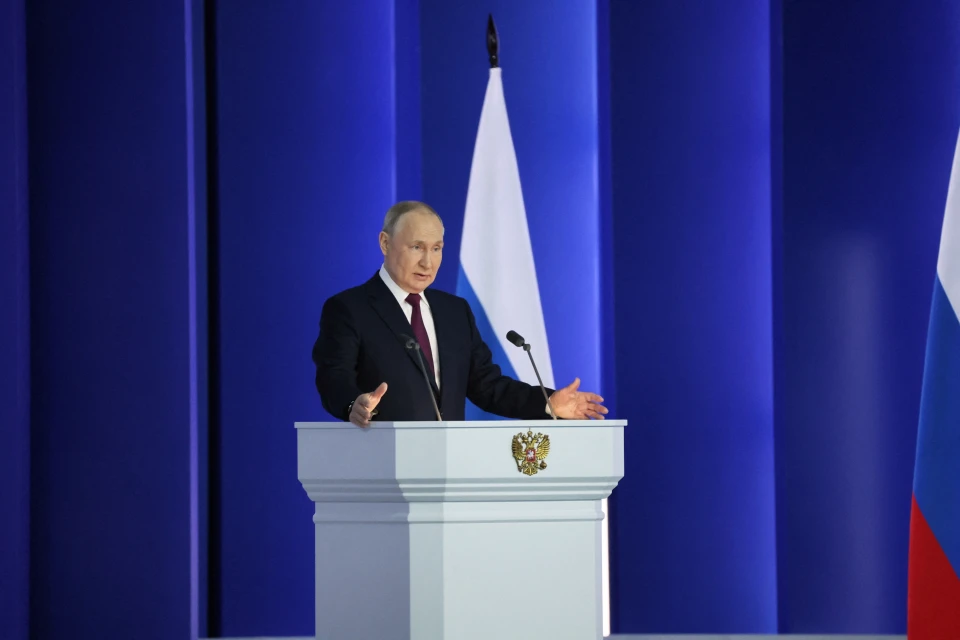 путін