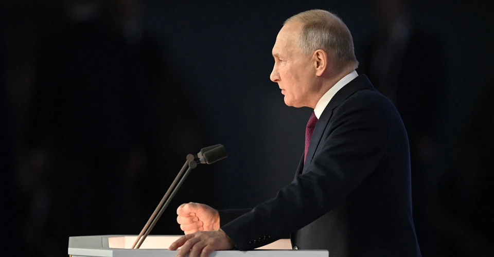 путін