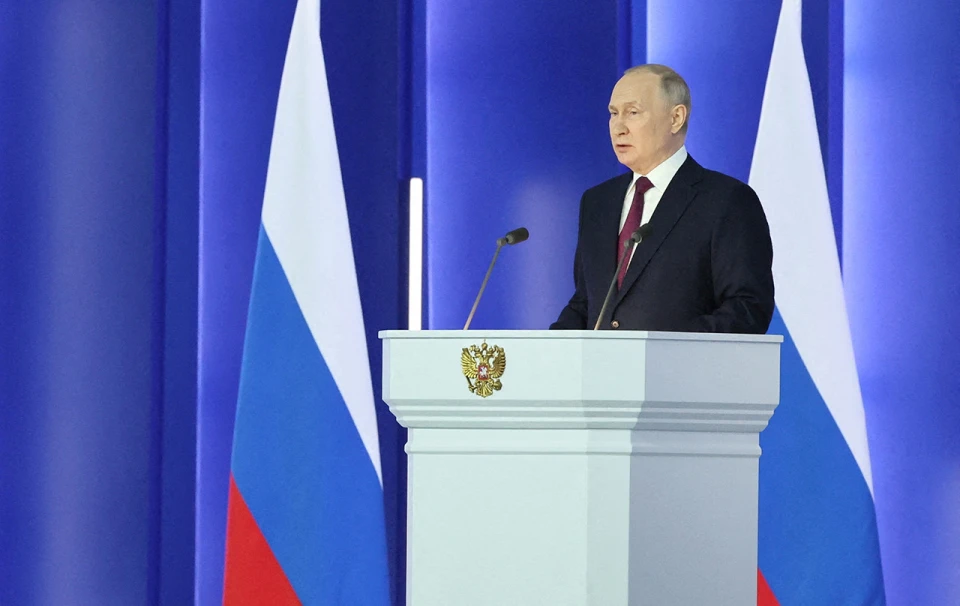 путін
