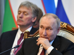 Володимир Путін і Дмитро Пєсков Володимир Путін і Дмитро Пєсков