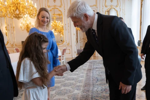 Президент Чехії зустрівся з українкою