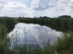 земля зі ставком