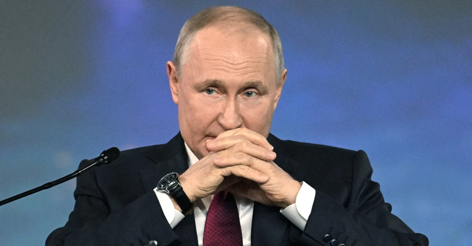 Путін