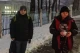 на фото діти, яких не пустили в укриття через собаку
