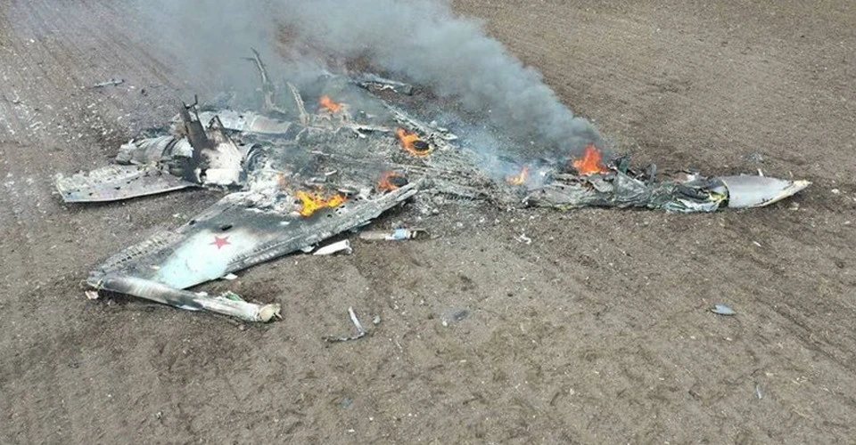 The wreckage of a Su-35 fighter jet