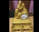 камінний годинник
