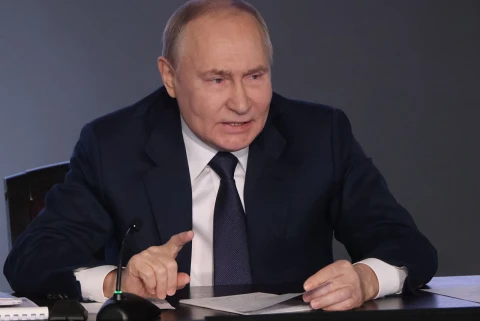 путін