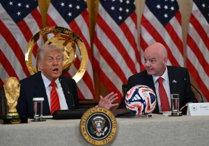 Дональд Трамп та Джанні Інфантіно (праворуч) Дональд Трамп та Джанні Інфантіно (праворуч)