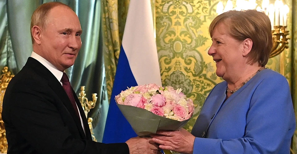 Путін та Меркель