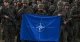 Польські солдати з прапором НАТО