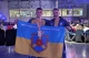 На фото: Іван Дзяйло з тренером Ігорем Іваницьким із прапором Красненської територіальної громади на Чемпіонаті Європи з армрестлінгу у Будапешті